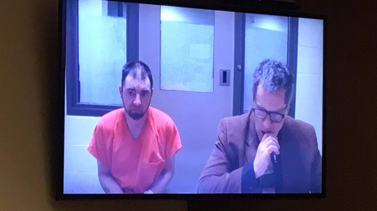 Bail was set at $100,000 on Wednesday for Christopher C. Wade (left), a man accused of killing a motorcyclist and injuring one of his three children in a crash near Lacey Tuesday night.
