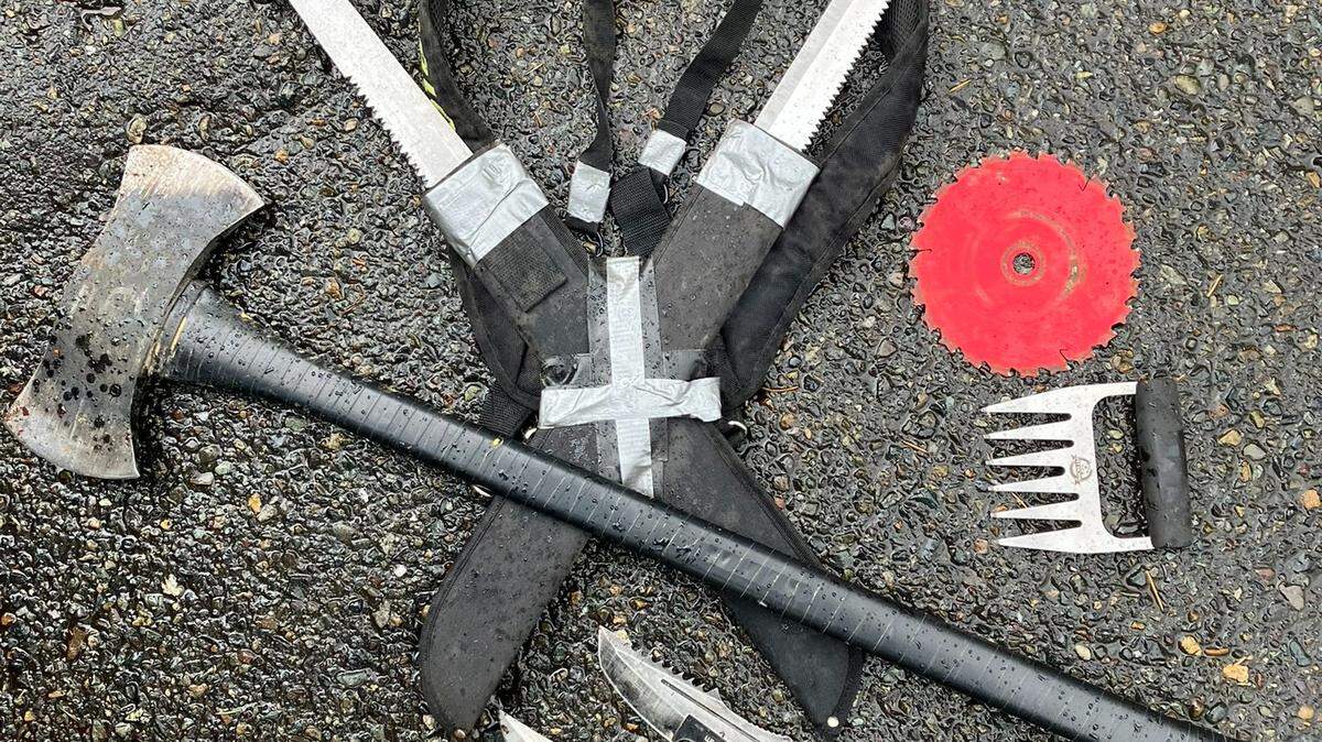 In addition to the ax, the suspect had what Olympia police described as “two large fixed-blade knives, a saw blade, a metal claw and two hunting knives.”