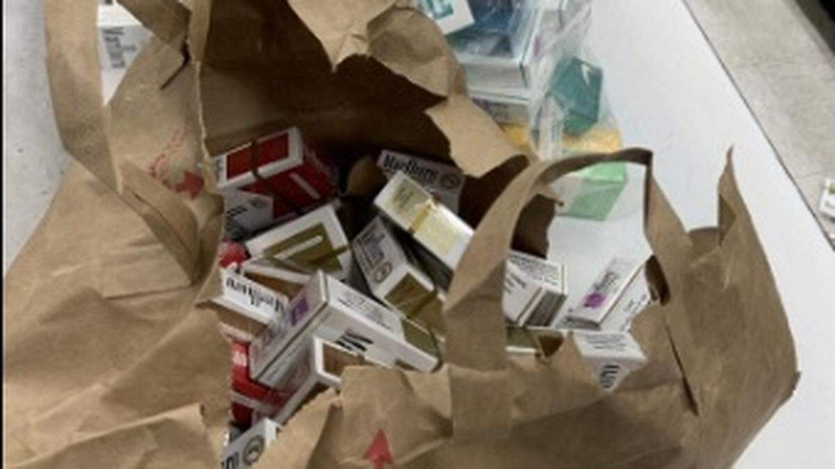 A 40-year-old man was arrested on suspicion of two counts of second-degree burglary earlier this month in west Olympia, according to police.