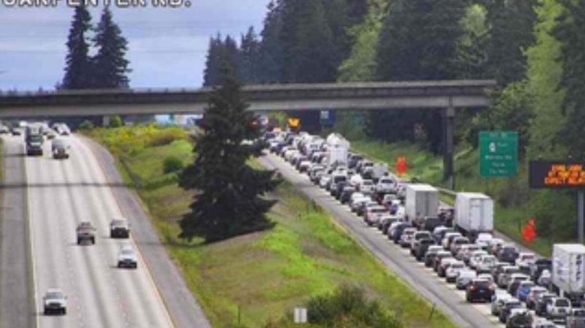 Northbound I-5 traffic near Lacey quickly backed up after WSDOT crews needed to repair a concrete panel Sunday morning near Marvin Road.