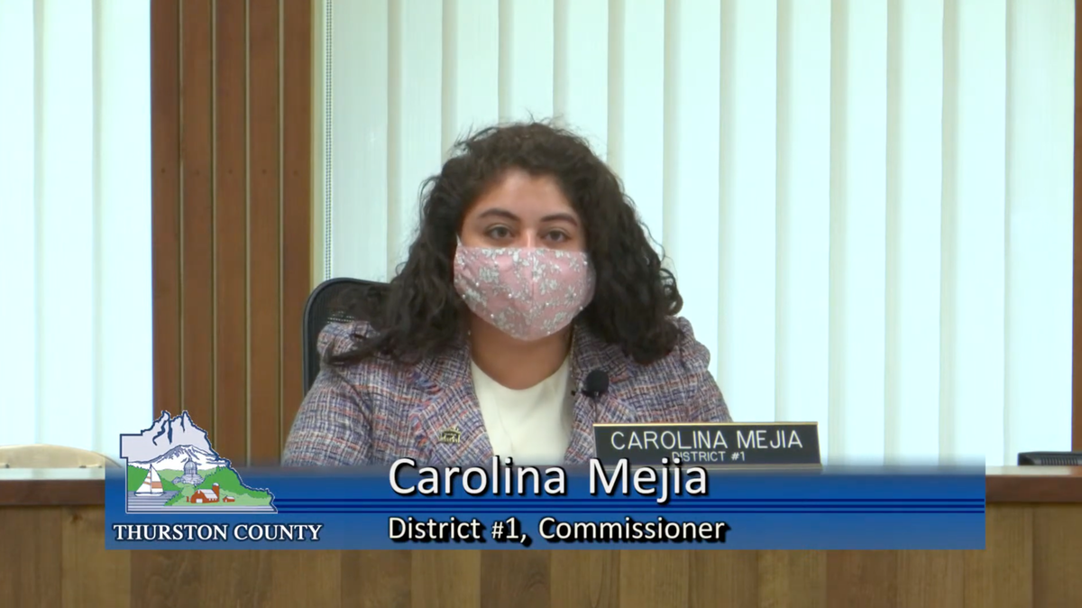 Thurston County Commissioner Carolina Mejia speaks in favor of a resolution mandating vaccines or weekly testing for all county employees on Tuesday. The Board of County Commissioners approved the resolution 2-1 after over two dozen people voiced their support in the public comment period.