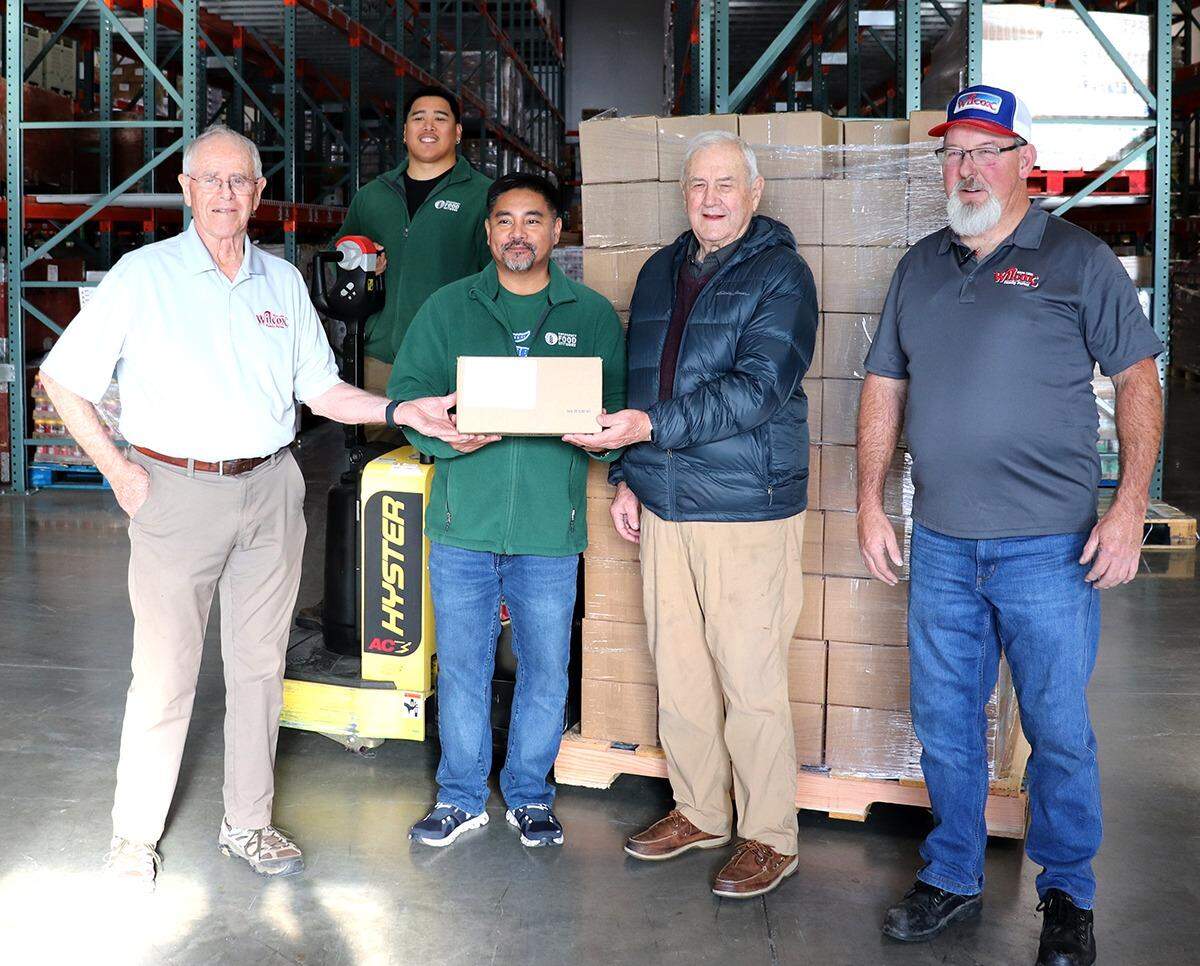 Longtime Wilcox driver Scotty Parker and members of the Wilcox family personally joined the Emergency Food Network staff to help deliver the first round of eggs.