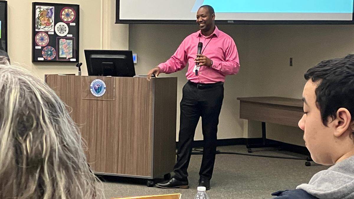 Antonio Sandifer, director of equity and languages at North Thurston Public Schools, answers questions Tuesday night during a joint meeting of the North Thurston school board and Lacey City Council.