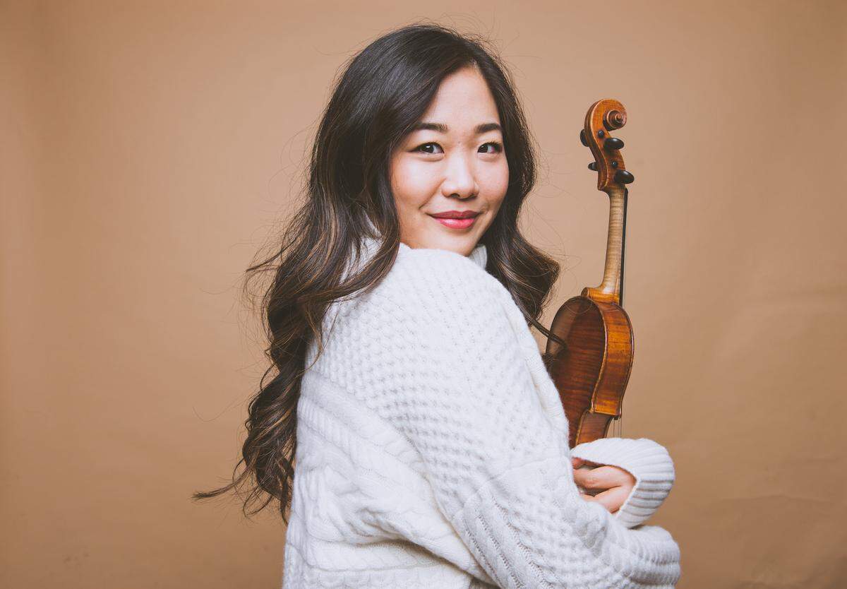 Violinist Kristin Lee, the artistic director of Olympia’s Emerald City Music, will play Tchaikovsky’s Violin Concert with the Olympia Symphony Orchestra at its Sunday, March 17, “Pride” concert.