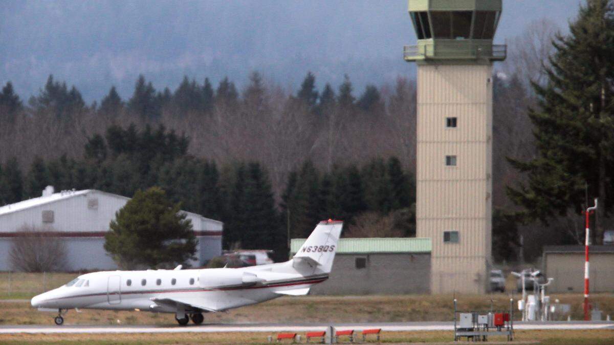 A jet prepares to take off in front of the flight-control tower at the Olympia Regional Airport in 2013.