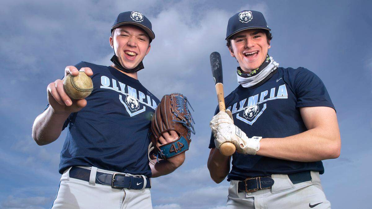 Olympia junior pitcher/outfielder Rylan Haider (left) and senior pitcher/infielder Aiden Herrick are expected to lead the Bears as they contend for a 4A SPSL title. They are shown before baseball practice at Olympia High School on Friday, April 2, 2021.