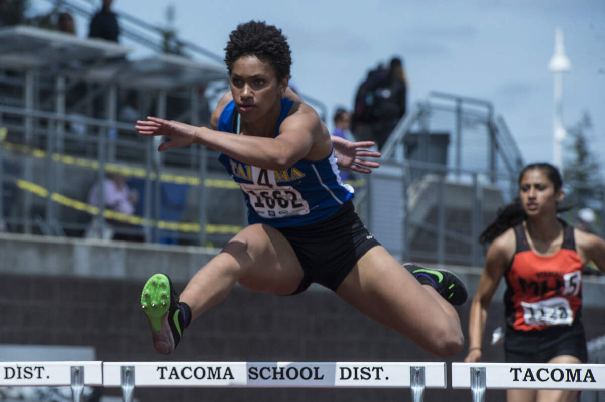 Tahoma's Alaina Brady competes in the 4A girls 300-meter hurdles prelims at the 4A/3A/2A track and field state championships at Mount Tahoma High School in Tacoma on Friday, May 25, 2018.