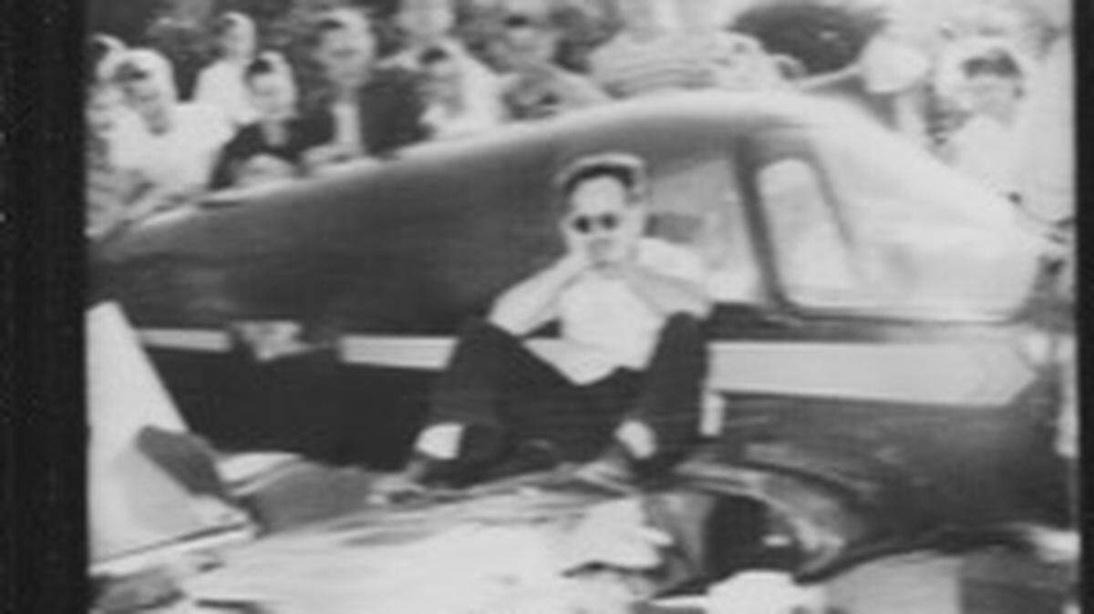 A newspaper photographer captured this image of Dorothy Wilhelm’s Uncle Pat, William Patrick Franco, amid the wreckage of his kit plane in a busy Los Angeles intersection in 1946.