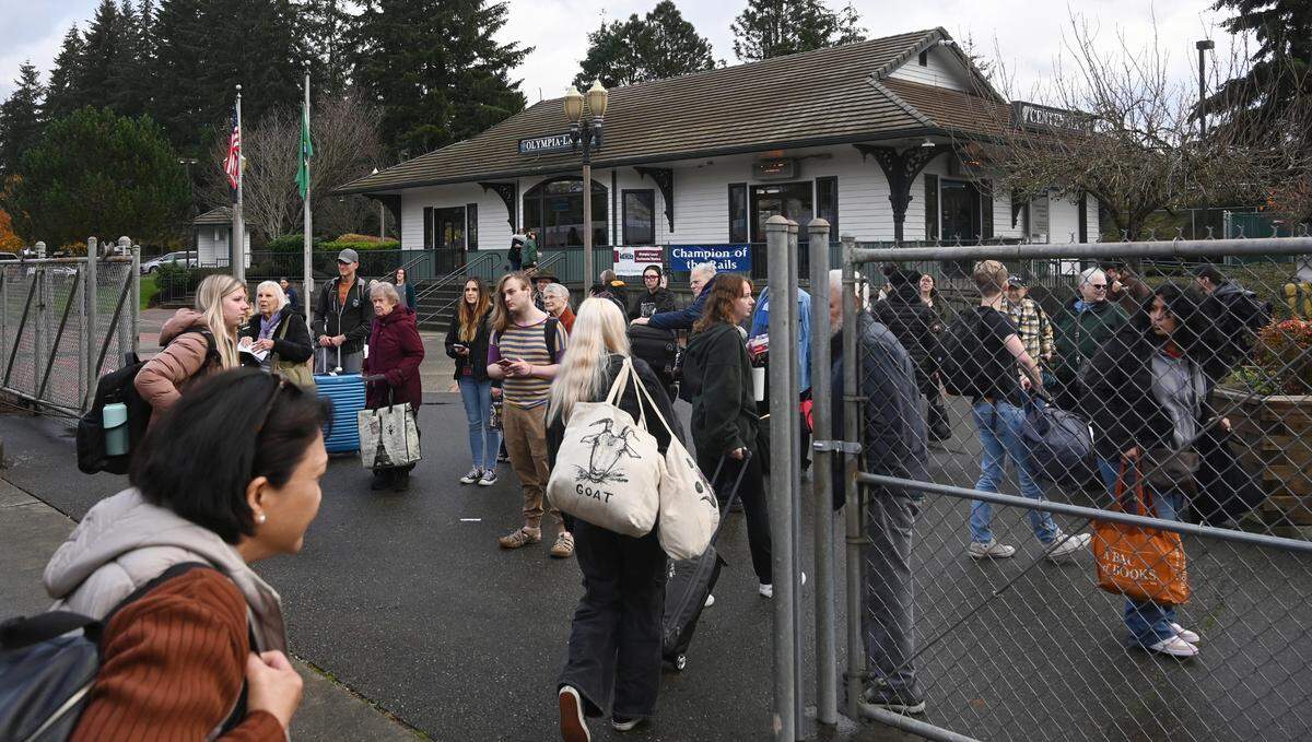 Amtrak’s Centennial Station in Lacey was bustling on Tuesday, Nov. 26, as people boarded trains to grandma’s house and other holiday destinations. The Tuesday and Wednesday before Thanksgiving and the Sunday after are the busiest travel days of the year, Amtrak says.