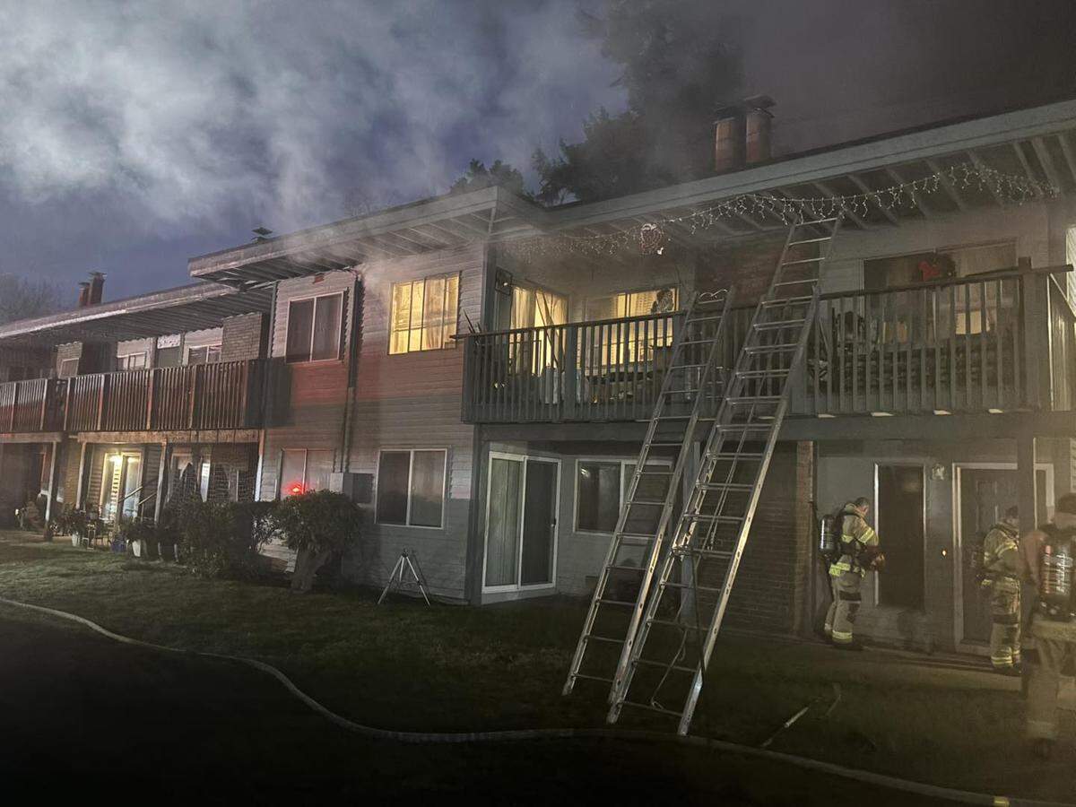 A mother and four children were rescued from a Lacey apartment fire Saturday morning after crews used ladders to remove them from a second-floor balcony.