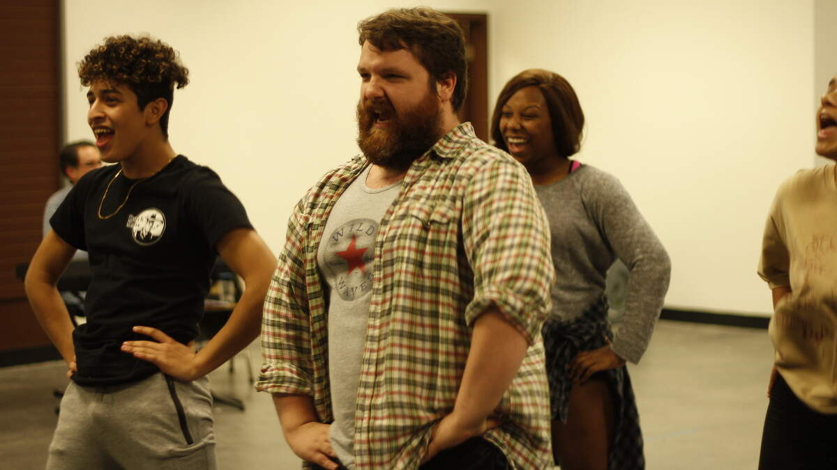 Guy Simpson III rehearses his role as Brad in Broadway Olympia’s production of “The Rocky Horror Show,” opening on Halloween.