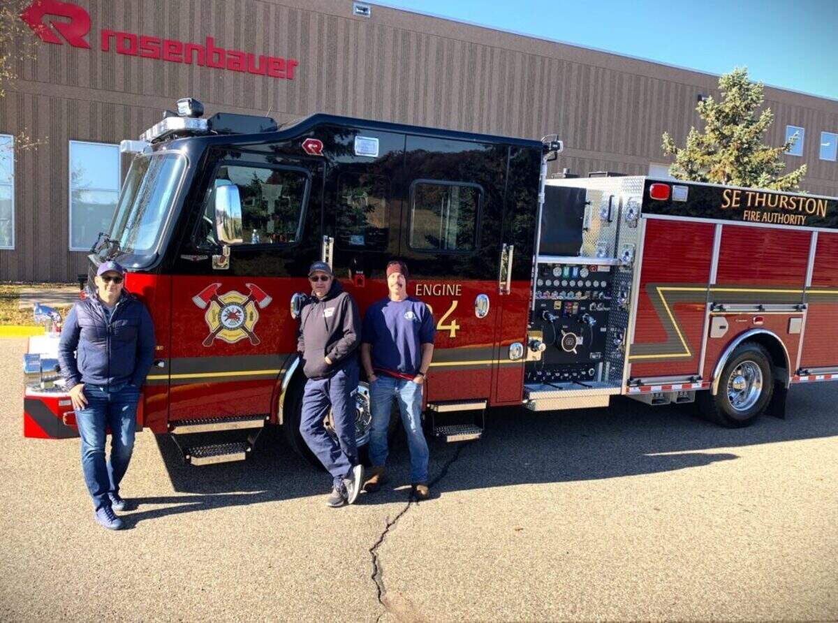 From left, Deputy Chief Kevin Denton, Captain Eric Hetand and firefighter Tony Brosco, all from the Southeast Thurston Fire Authority. The fire authority bought a new pumper truck in 2024 with help from the Washington State Treasurer’s Office.