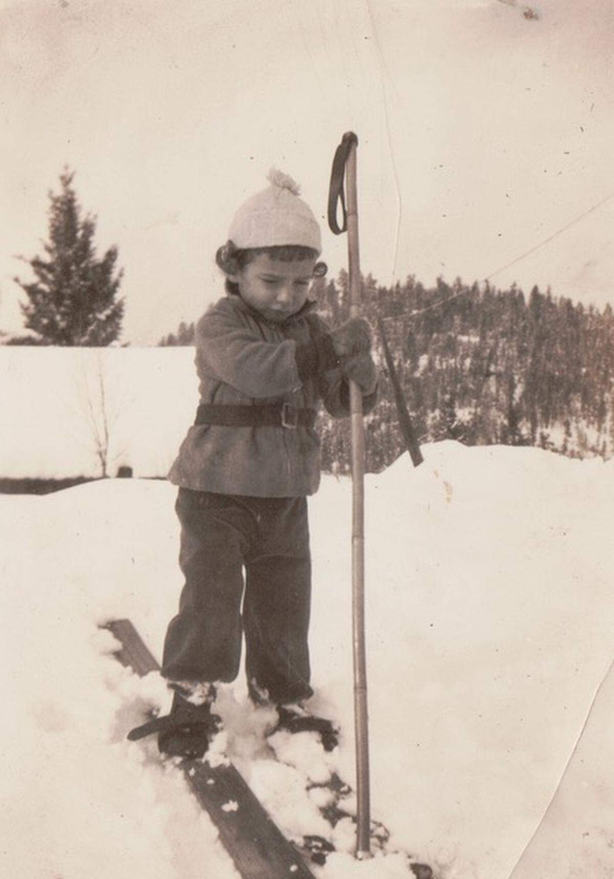 Dorothy, age 4, casing the tree situation in Warland, Montana.