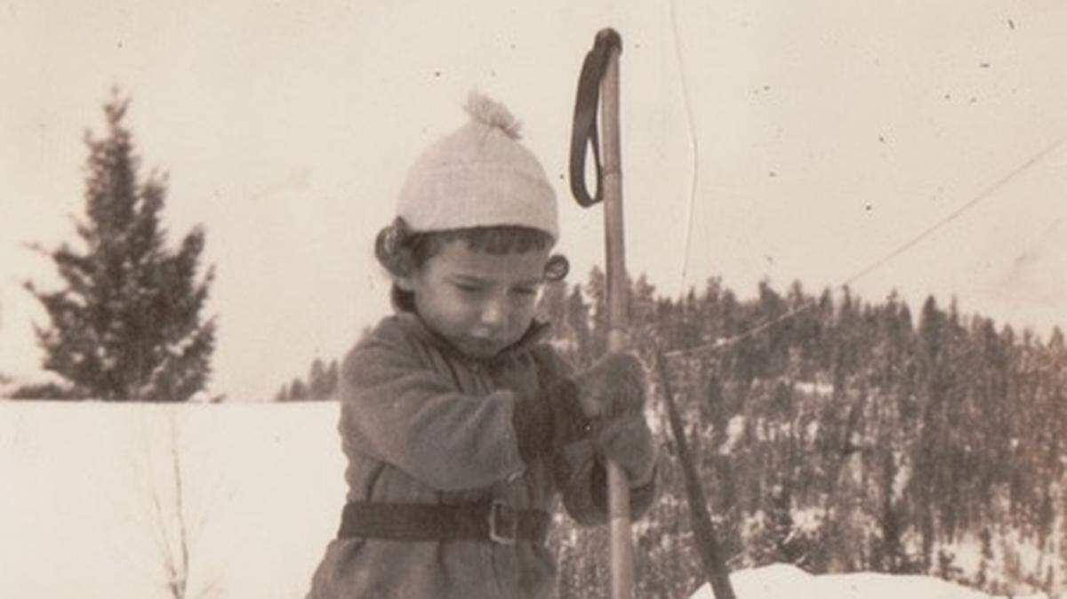 Dorothy, age 4, casing the tree situation in Warland, Montana.