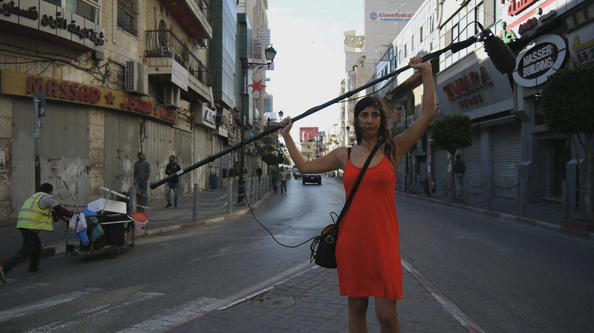 An image from “The Men Behind the Wall,” an autobiographical documentary about Israeli filmmaker Ines Moldavski’s experiences dating Palestinian men on Tinder.