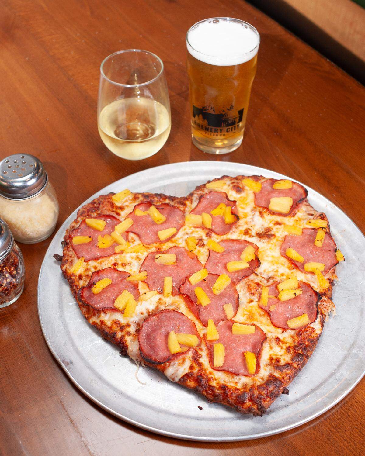A heart-shaped Brewery City Pizza