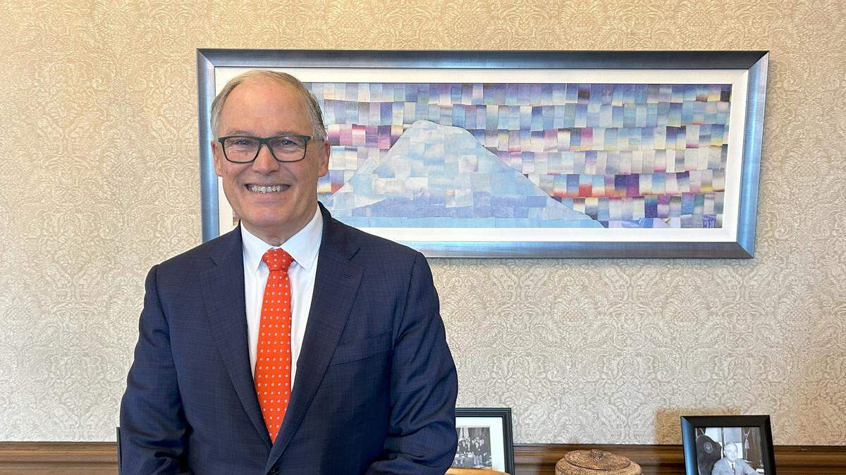 Gov. Jay Inslee poses for a photo in the Governor’s Office on Thursday, Dec. 19, 2024.