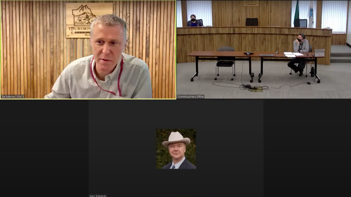 Thurston County Commissioners Carolina Mejia and Tye Menser respond to commissioner Gary Edwards, who questioned whether there are any examples of racism in the county during a virtual Thursday meeting. County Manager Ramiro Chavez introduced a resolution on March 2 that would declare racism a crisis in the county.