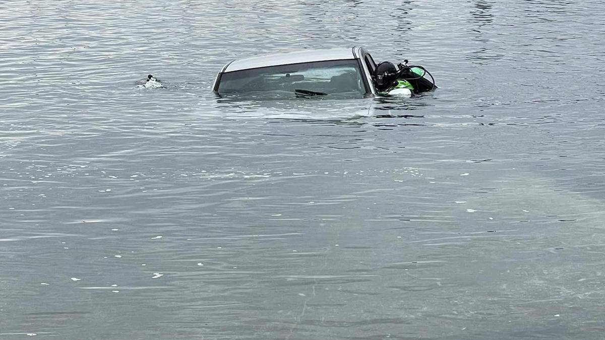 The truck rolled into the water at Boston Harbor marina Friday morning.