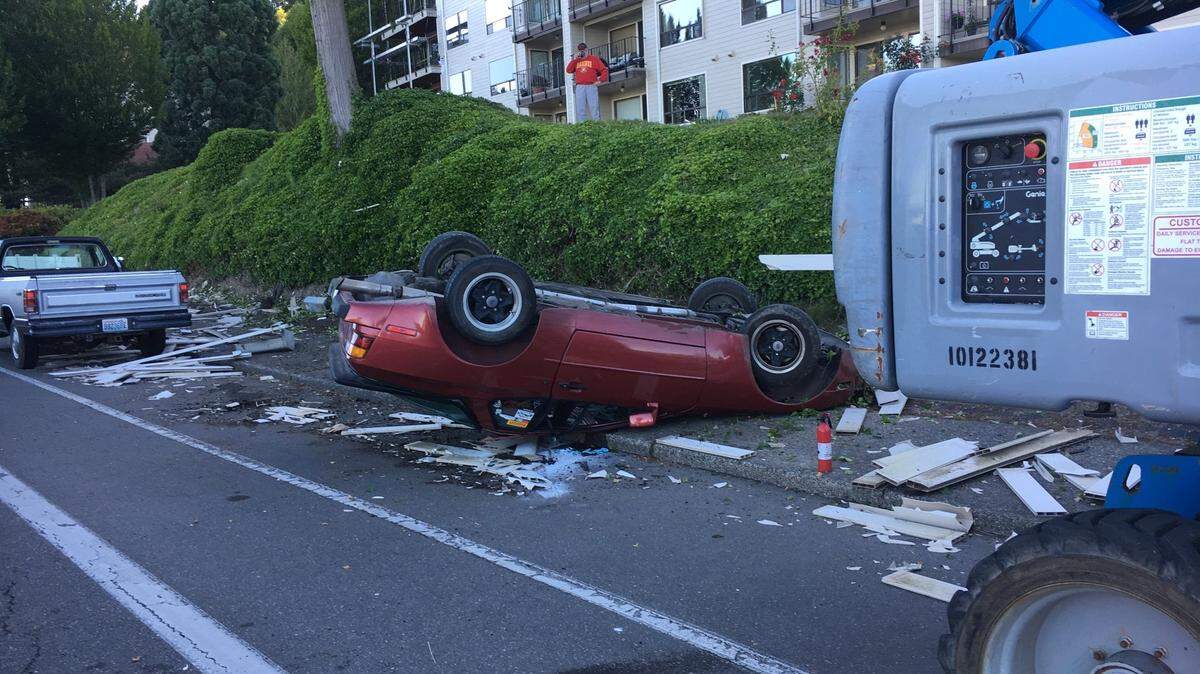 A woman in her 30s was not injured after she lost control of her car and it rolled on East Bay Drive Monday morning.