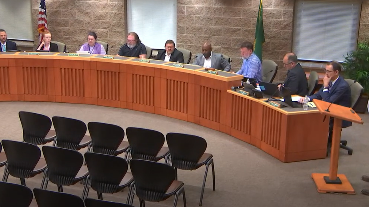 Utility Engineer Brandon McAllister, far right, addressed Lacey City Council Tuesday, June 18, about a wholesale water agreement with Olympia.