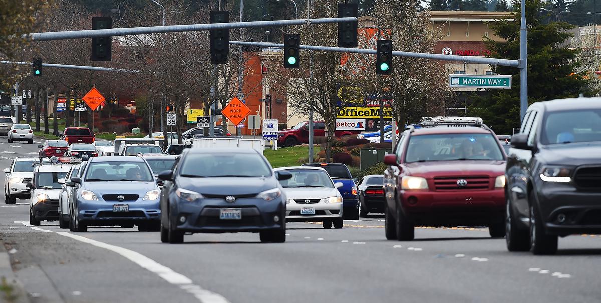 Traffic bustles along Marvin Road at Martin Way East.
