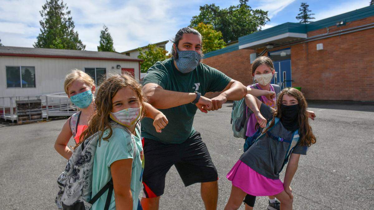Masks and social distancing are still the norm at South Sound YMCA and the Boys and Girls Club of Thurston County, two organizations that offer childcare before and after school throughout the region.