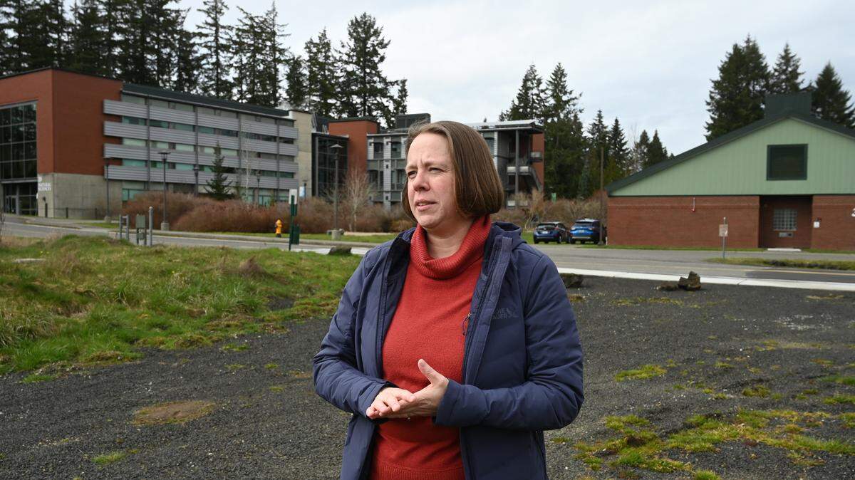 Standing in a undeveloped land parcel under consideration for development as a soccer field on the campus of South Puget Sound Community College on March 19 the college’s Vice President of Advancement Kelly Green outlined that project and spoke about possible future student housing additions.