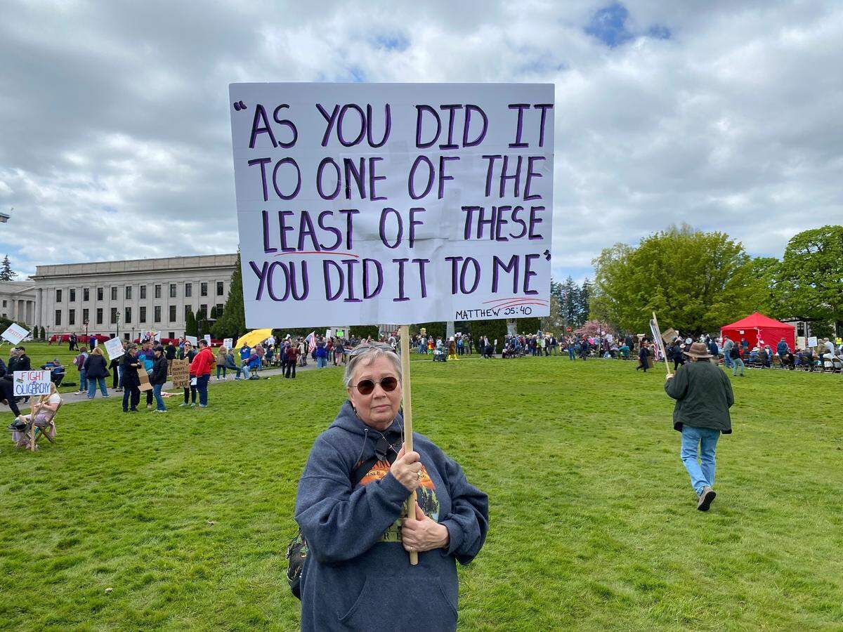 Biblical quotes made their way onto a number of signs during the Easter weekend anti-Trump protest at the Capitol Campus in Olympia.