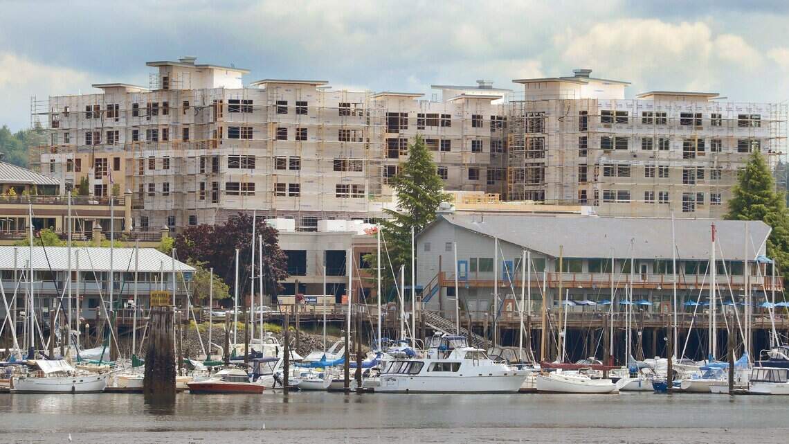 Engineering firm to move into downtown apartment building slated to open in August