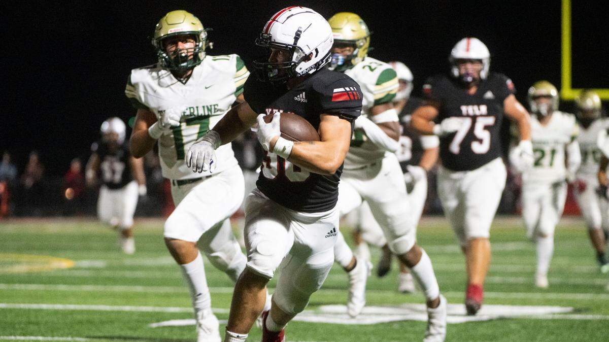 Yelm running back William Carreto breaks away from Timberline’s secondary for a large rushing gain during the first quarter of a 3A SSC game on Thursday, Oct. 13, 2022, at Yelm High School in Yelm, Wash.