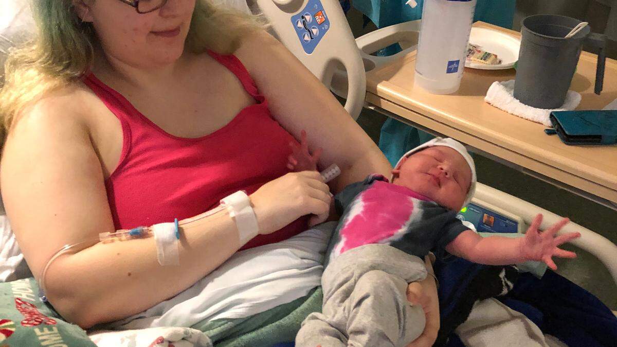 Rosalie Marie Howe weighed seven pounds, 15 ounces and was 21.5 inches when she was born at 10:43 p.m. Jan. 1. at Providence St. Peter Hospital. She is shown here being held by new mother Lokelani Howe.