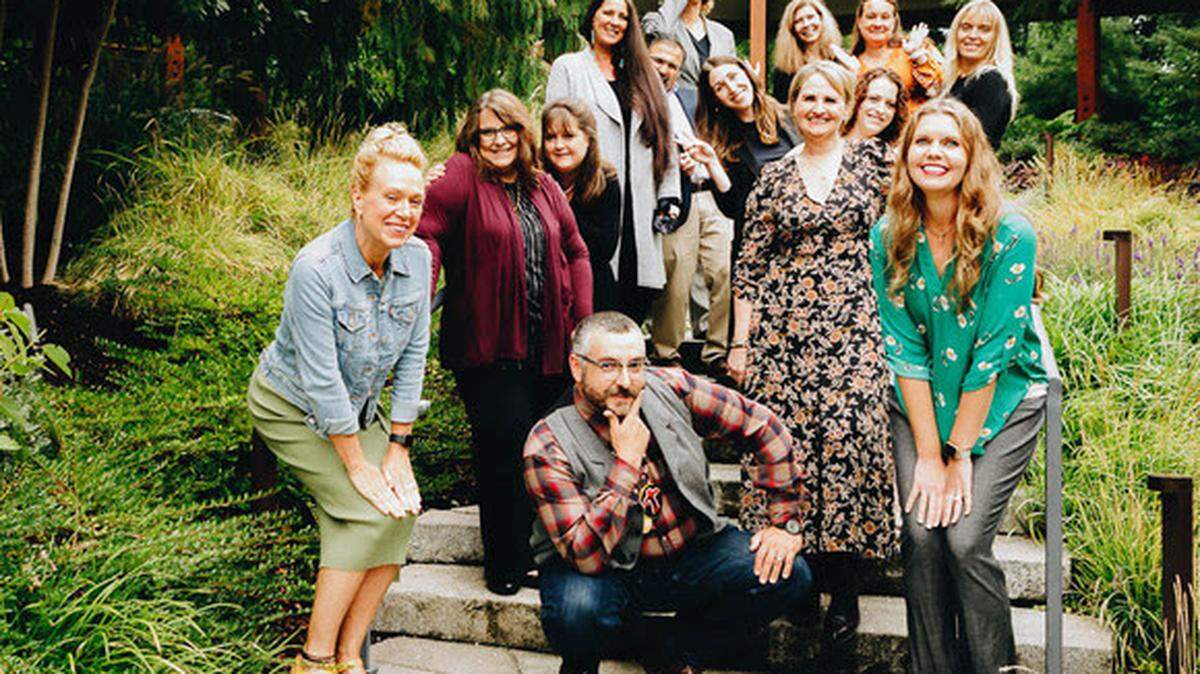 The Washington state Teacher of the Year for 2022 is Jerad Koepp, shown here in front of other regional teachers and classified employees of the year announced by the state Office of Superintendent of Public Instruction on Monday.
