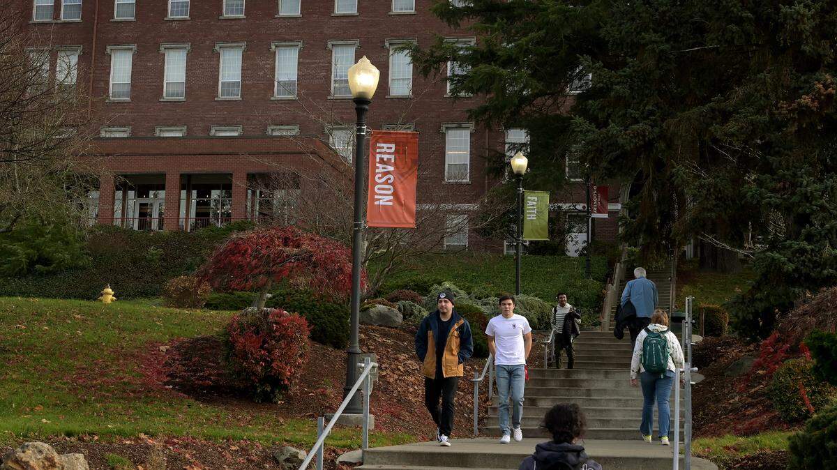 Students make their way through Saint Martin’s University’s central campus.