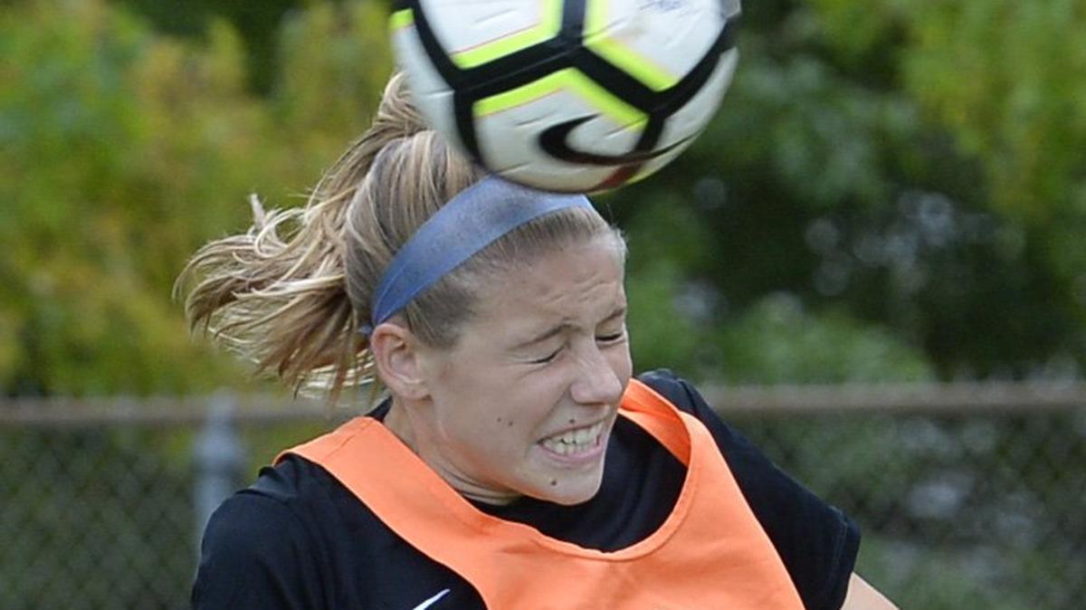 Olympia High School defender Landrey McCann nails a header during practice on Monday, Sept. 10, 2018.