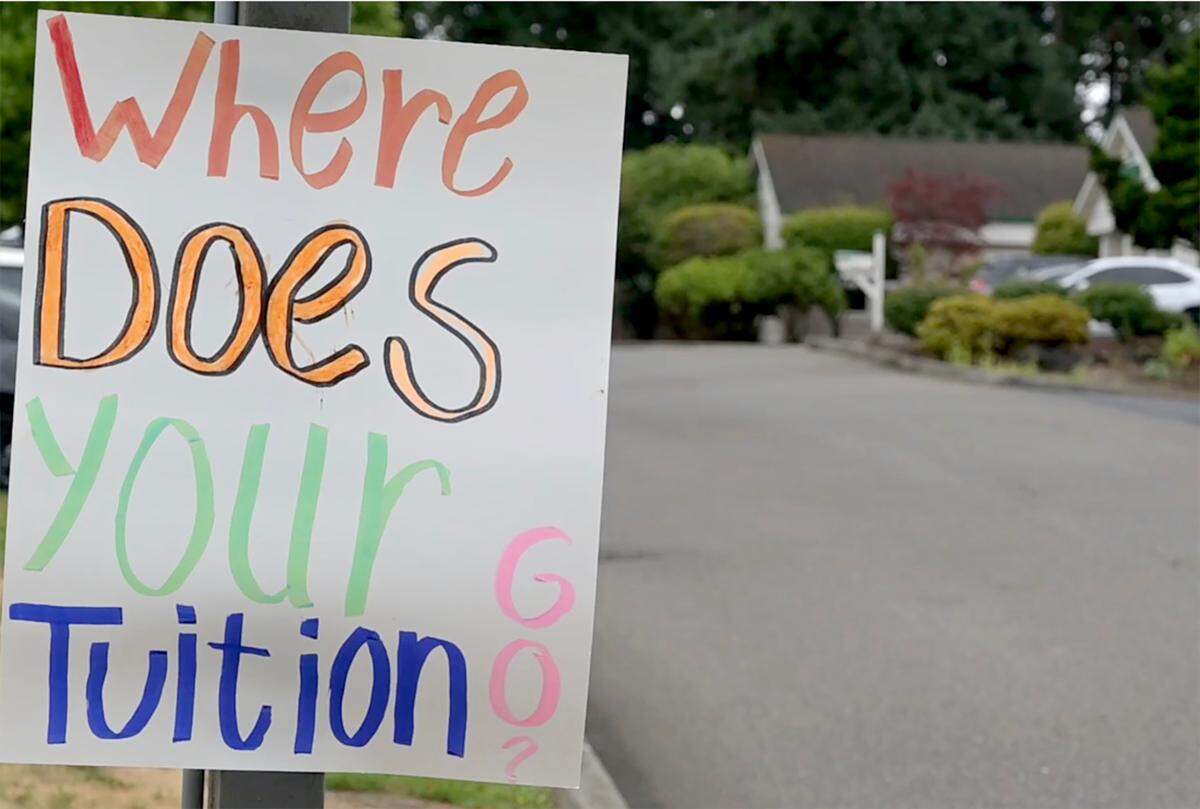 Waving picket signs early Monday morning a group of teachers from the nearby Cadence Academy Preschool at 8911 Martin. Way E. In Lacey stage a protest for higher and more stable wages.