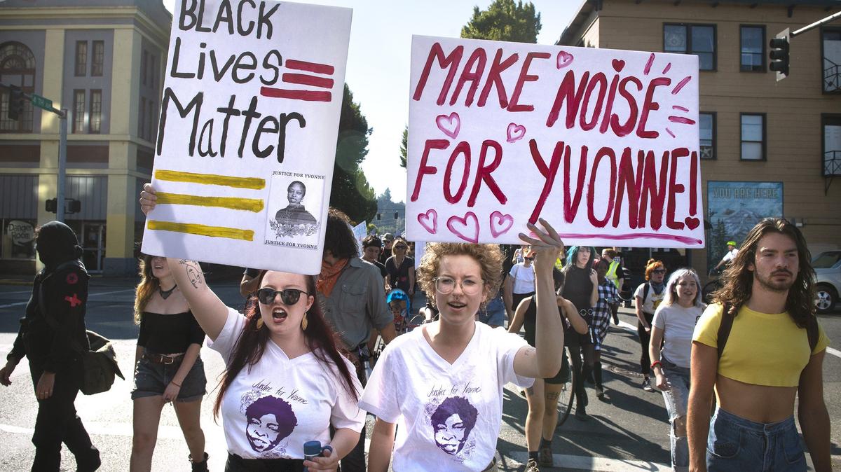 Kaylee Sheller (left) and Oliver Cramer, both of Olympia, march with about 200 supporters demanding a inquest into the death of Yvonne McDonald, a 56-year-old west Olympia woman found unconscious in a yard near her apartment in 2018. Sheller and Cramer were part of the “Make Some Noise for Yvonne” rally and march in downtown Olympia on Sept. 6, 2018. The group felt the Olympia police were too quick to rule the death an accidental fall.