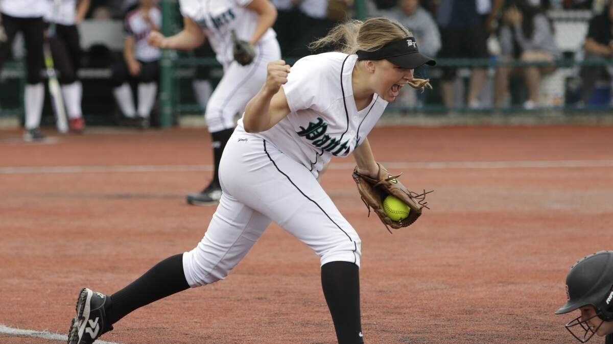Bonney Lake second baseman Brynn Nelson, left, gets Snohomish’s Janell Williams out at first during a double play in the 3rd inning of a 3A state softball championship game on Saturday, May 26, 2018 at the Regional Athletic Complex in Lacey. Bonney Lake won 8-5.