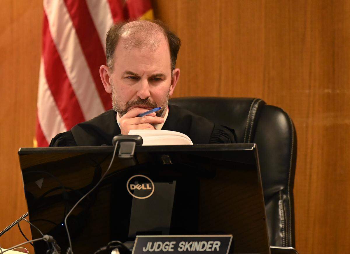 Thurston County Superior Court Judge John C. Skinner reads numerous letters from family & friends of Elizabeth Provence as a number of people gave their personal testimonies about her before passing sentence on April 18 on Evelyn Laine McMurray for second degree manslaughter after she pleaded guilty during a March 11 arraignment to killing Provence Lacey police found Elizabeth Provence on Feb. 25. That day, McMurray called 911 for medical aid, saying she felt unwell after taking too much fentanyl the night before, according to court records. While first responders attended to her, she reportedly told them there was a body inside the apartment and she pointed to herself when asked how Provence died. Provence was reportedly bound with duct tape and a ratchet-type strap and appeared to have been dead for several days.