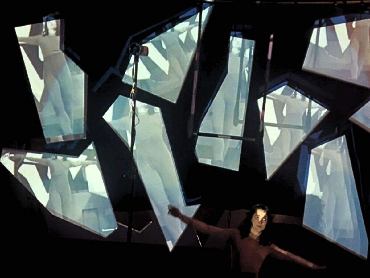 Mirrah Stoller is the producer and one of the performers in “Surveillance,” which mixes aerial dance with multimedia elements.