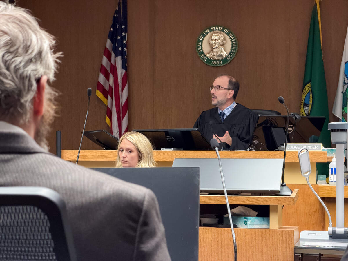 Thurston County Superior Court Judge John Skinder addresses the jury just before reading the verdict in a criminal case against Timothy Burke, 47, on Tuesday, June 9, 2026. The jury found Burke guilty of two counts of aggravated first-degree murder in connection to the 2023 deaths of Karen Koep, 62, and her husband, Davido, 68.