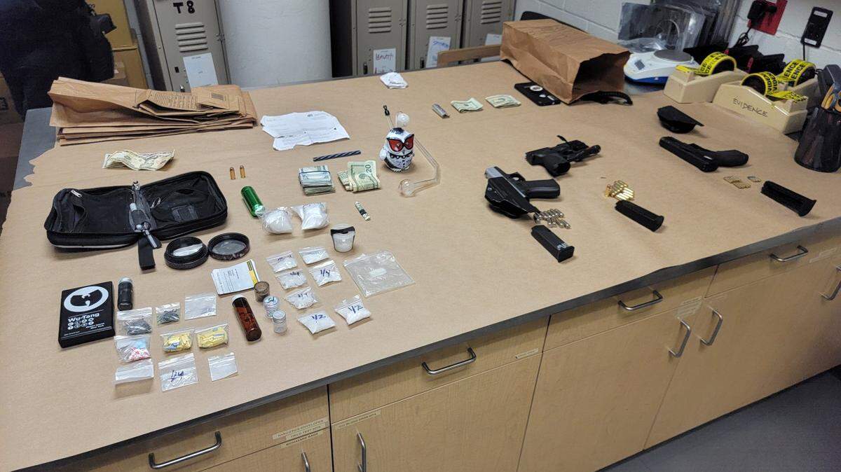 A photo of items, including drugs and firearms, that Olympia police recovered from a vehicle parked on the 4000 block of Martin Way East on Feb. 9.