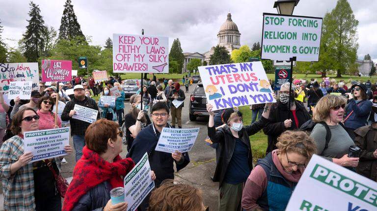 Photos: Thousands rally for women’s rights in Olympia