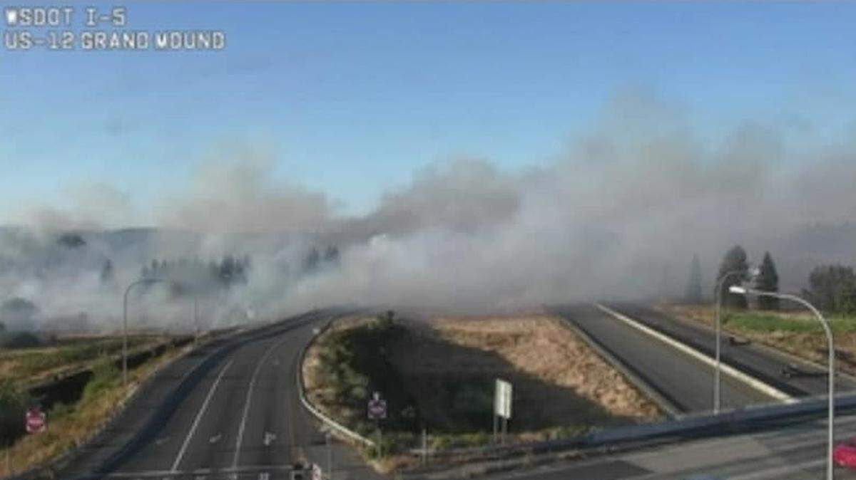 A brush fire caused traffic delays Thursday evening, Aug. 25, in Grand Mound. All lanes of I-5 were closed for hours as smoke made it difficult to see.