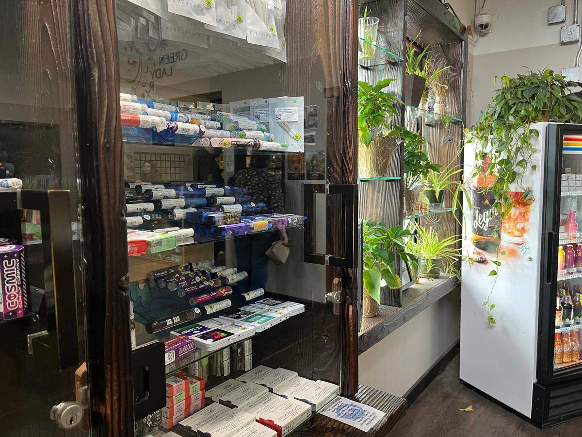 Cannabis products behind a locked glass at Green Lady in Olympia on April 29. Maggie Doyle, the store’s operations manager told McClatchy that dispensaries are a “high-risk” business, making it harder for them to get banking services. 