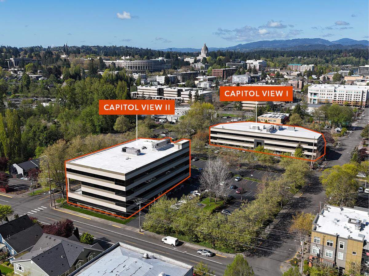 These two office buildings near downtown Olympia are for sale.