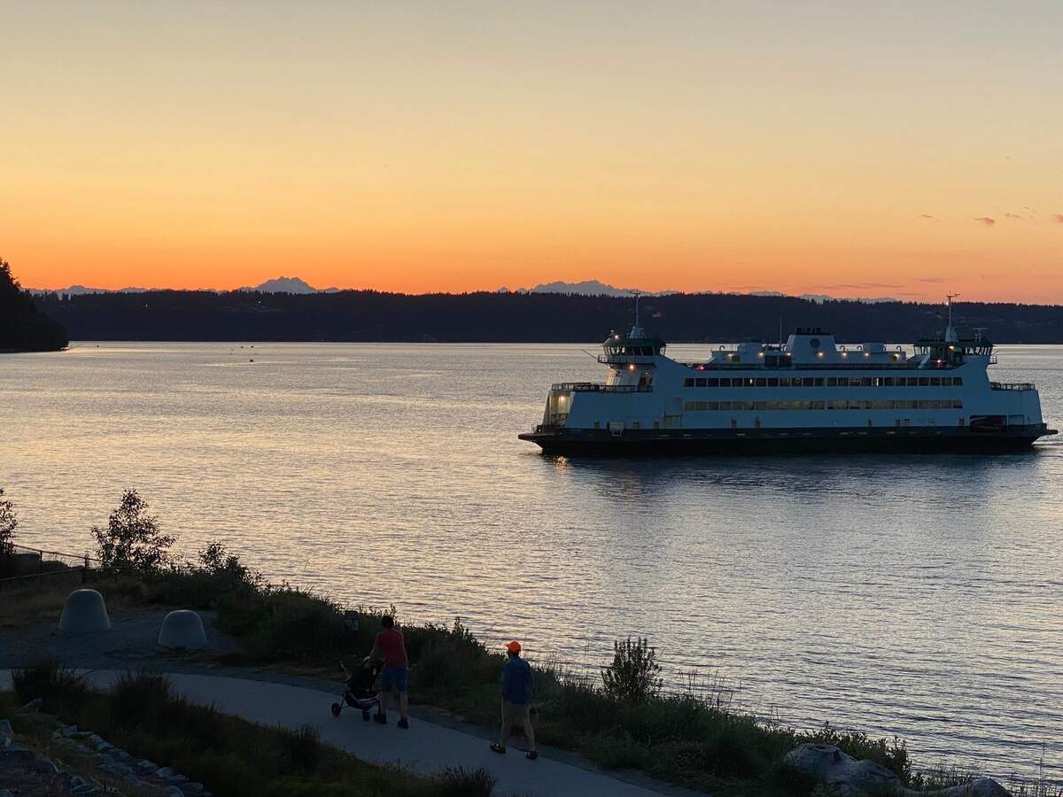 A Washington State Ferry makes its way from Vashon Island to Tacoma at sunset in August 2024.