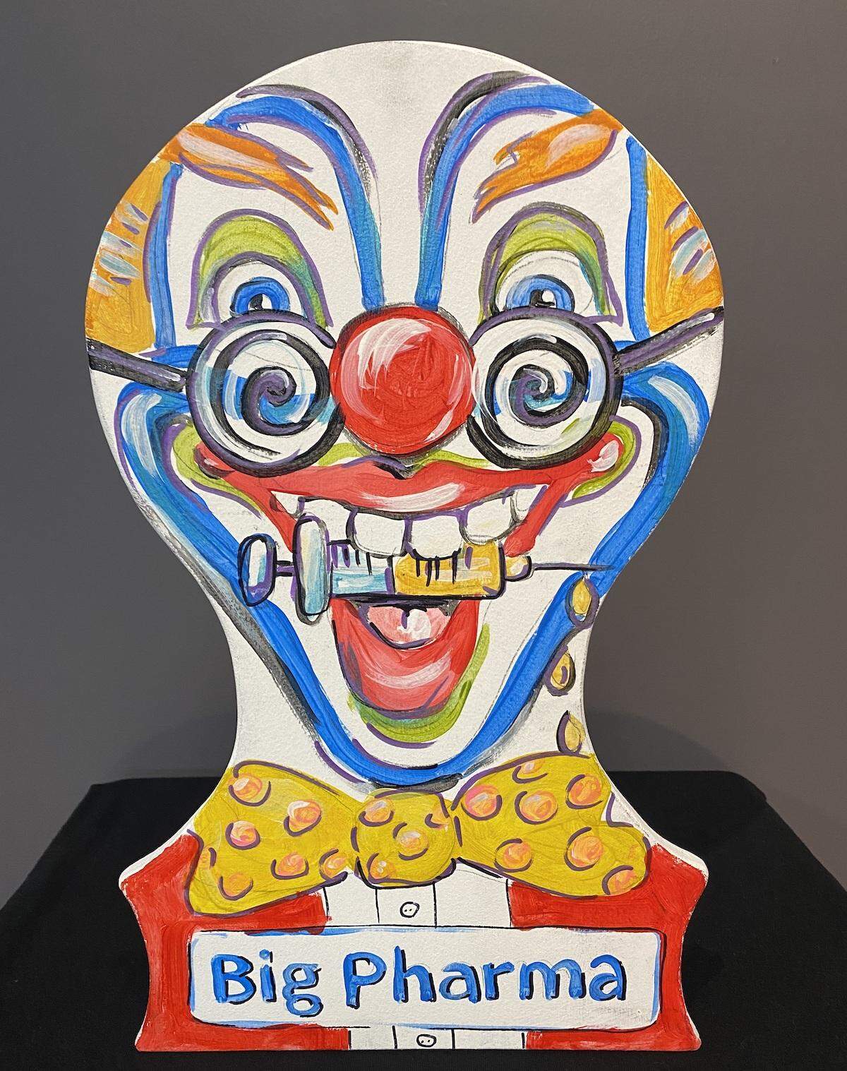 UnFair, an art installation that will raise funds for Homes First, offers the opportunity to play Knock Down the Lobbyist Clown and push a shopping cart on the Trickle Down Merry Go Round.