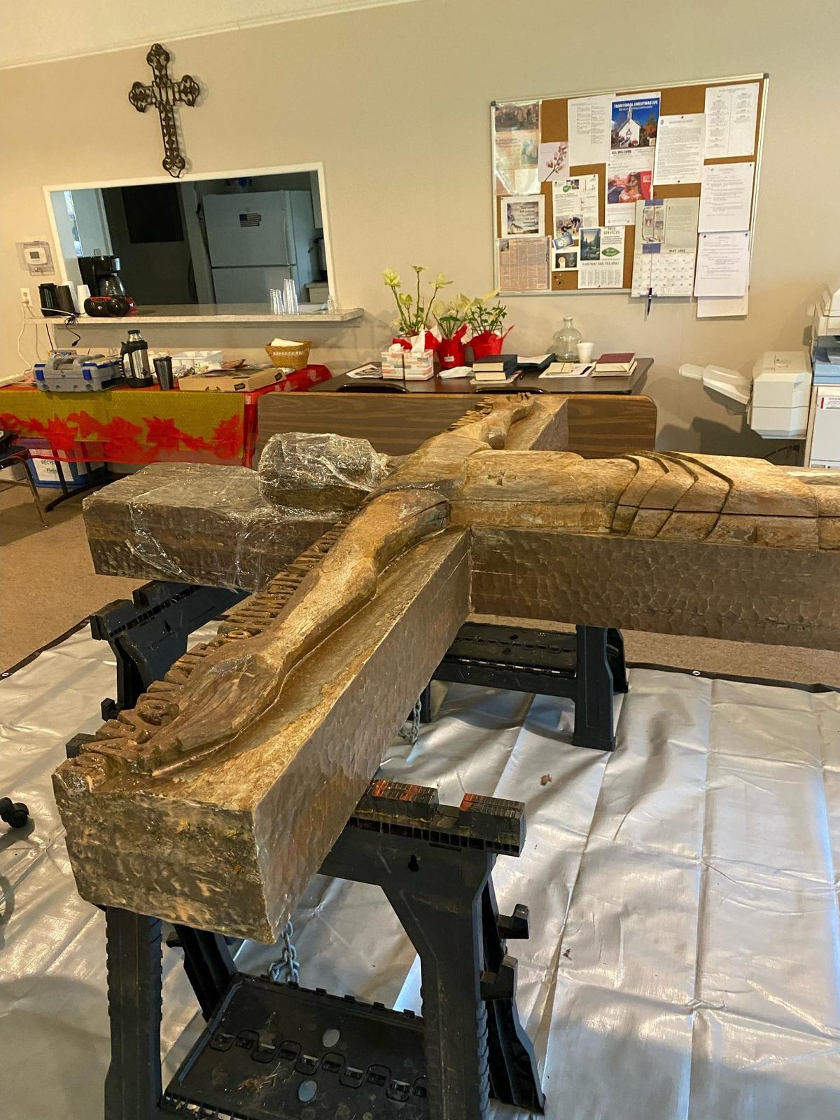 Stephen Morrison, the part-time rector at St. James Anglican Church in Tumwater who also does woodworking, worked to restore for cross for about a year. He had it propped on sawhorses in the church’s social hall for months.