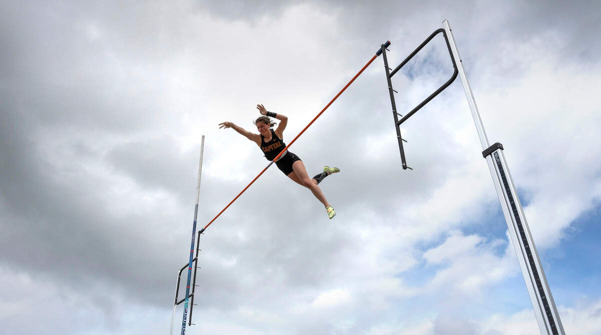 Capital junior Hana Moll clears the bar at 13’ 6” en route to a second-place finish in the 3A girls pole vault competition during the second day of the WIAA State Track and Field Championships at Mount Tahoma High School in Tacoma, Washington on Friday, May 27, 2022.